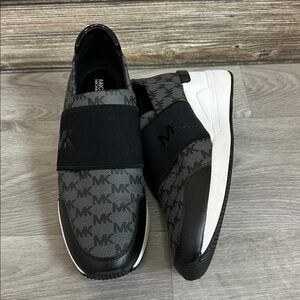 Michael Kors Black and White Logo Slip-Ons